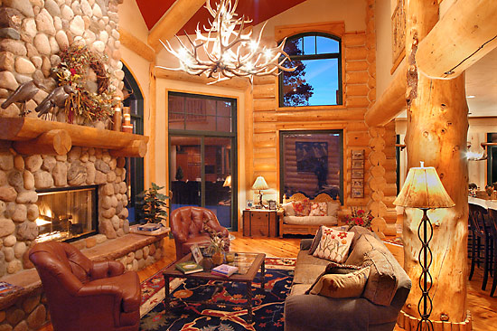 Feature post and log mantle in this handcrafted log home