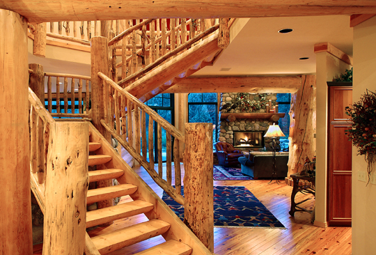 Handcrafted log stairs with rustic log railing