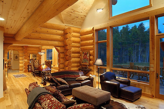 Chinked handcrafted log house with saddle notch corners
