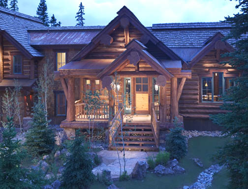 This hybrid log house appears to be a full handcrafted log house