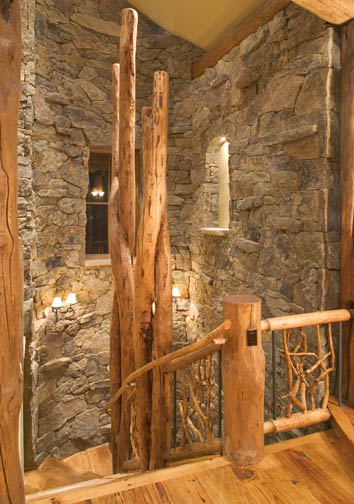 Unique character logs add drama to this homes staircase