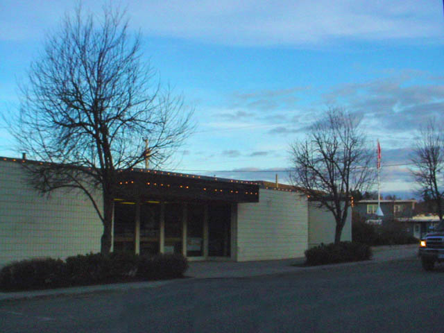 100 Mile House municipal building before log accents