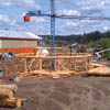 Log dance arbor constructed by Sitka Log Homes