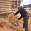 Log dance arbor constructed by Sitka Log Homes