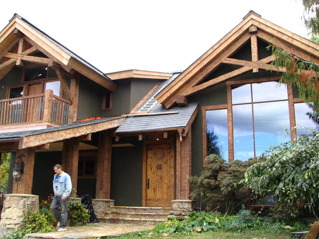 100 Mile House municipal building before log accents